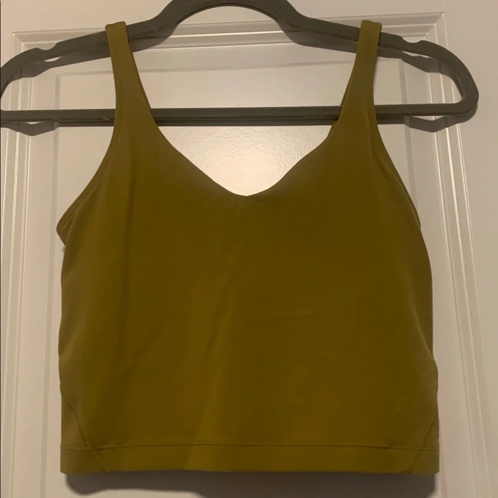 Lululemon Green Align Tank, Sz 4, no pads
FLAW in the front small hole pictured - Picture 1 of 5